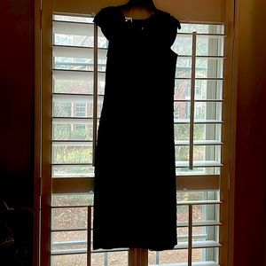 Cap sleeve black cocktail dress with stitched detail from Bloomingdale’s.